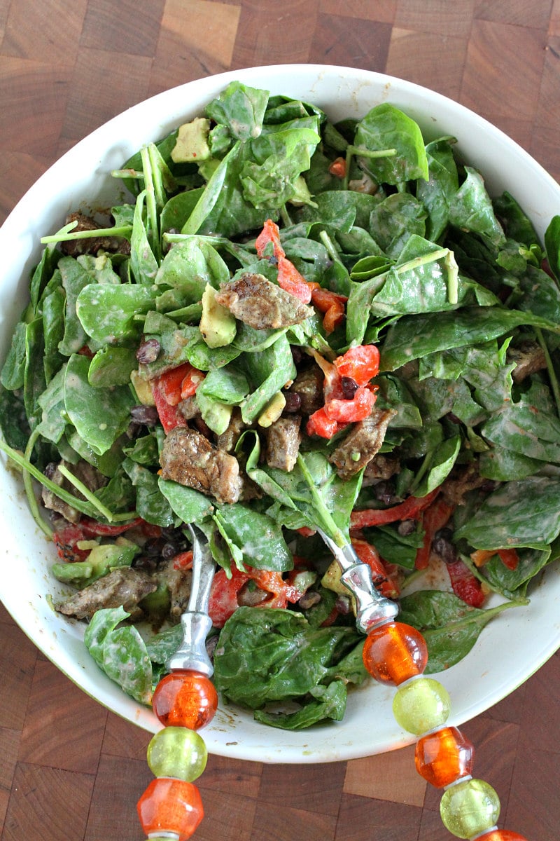Blackened Steak Salad recipe from RecipeGirl.com #blackened #cajun #steak #salad #recipe #RecipeGirl Blackened Steak Salad tossed with dressing and ready to serve