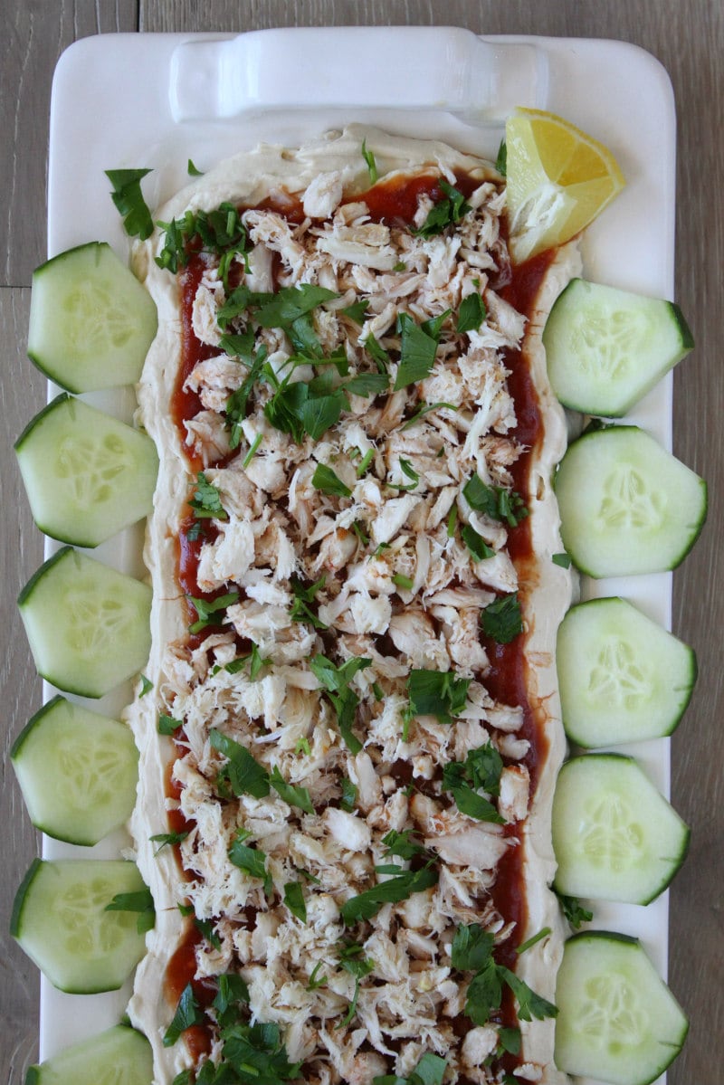 overhead shot of crab spread surrounded by sliced cucumber