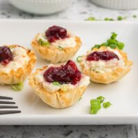 cranberry crab phyllo cups on a platter