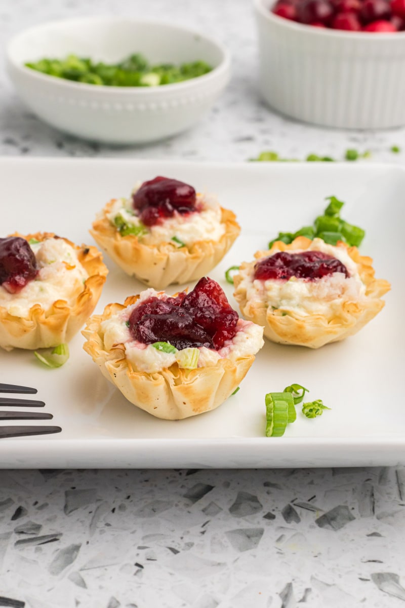 cranberry crab phyllo cups on a platter