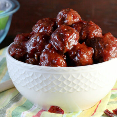 cranberry meatballs in a white bowl