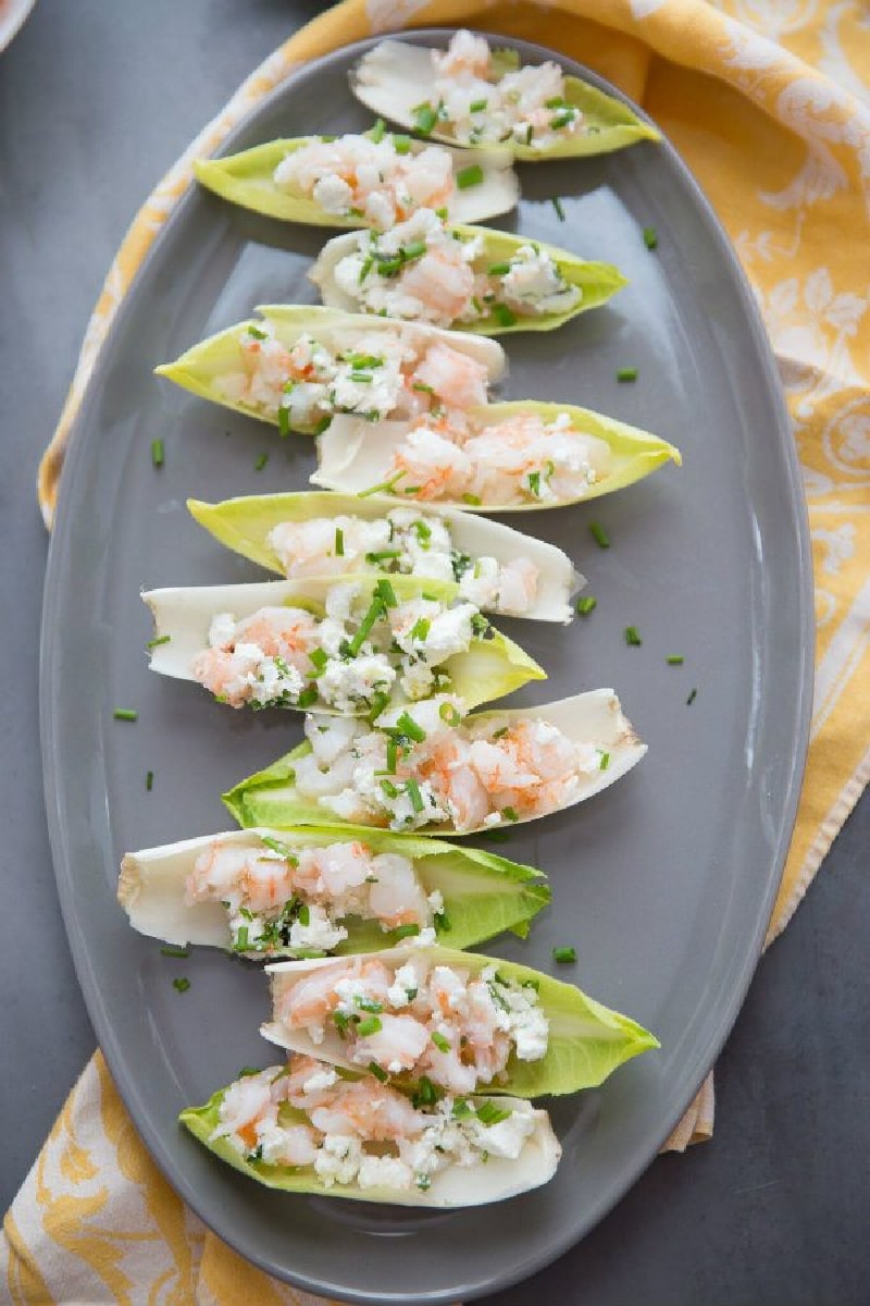 Endive with Shrimp Salad recipe from RecipeGirl.com #endive #shrimp #salad #appetizer #recipe #RecipeGirl endive with shrimp salad on a gray platter