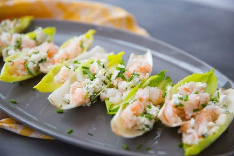 Endive with Shrimp Salad recipe from RecipeGirl.com #endive #shrimp #salad #appetizer #recipe #RecipeGirl endive with shrimp salad on a display plate