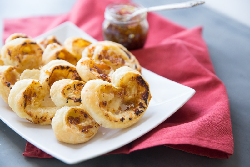 fig and gruyere palmiers on a serving platter