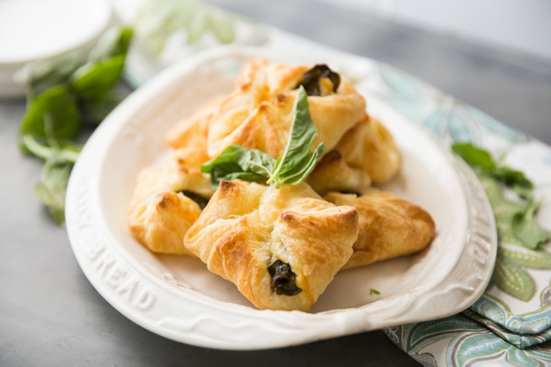 goat cheese tarts on a serving platter