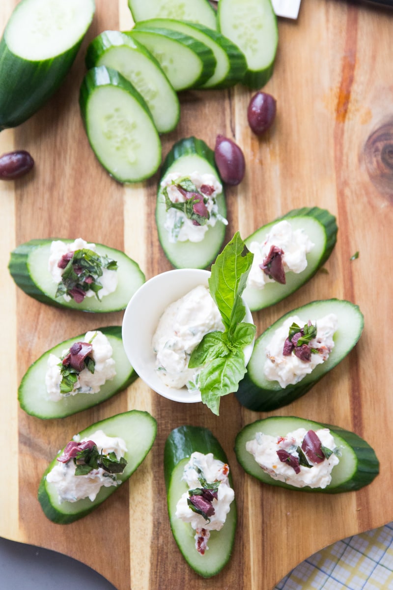 Greek Salad Bites recipe from RecipeGirl.com #greek #salad #bites #appetizer #recipe #RecipeGirl greek salad bites displayed on board