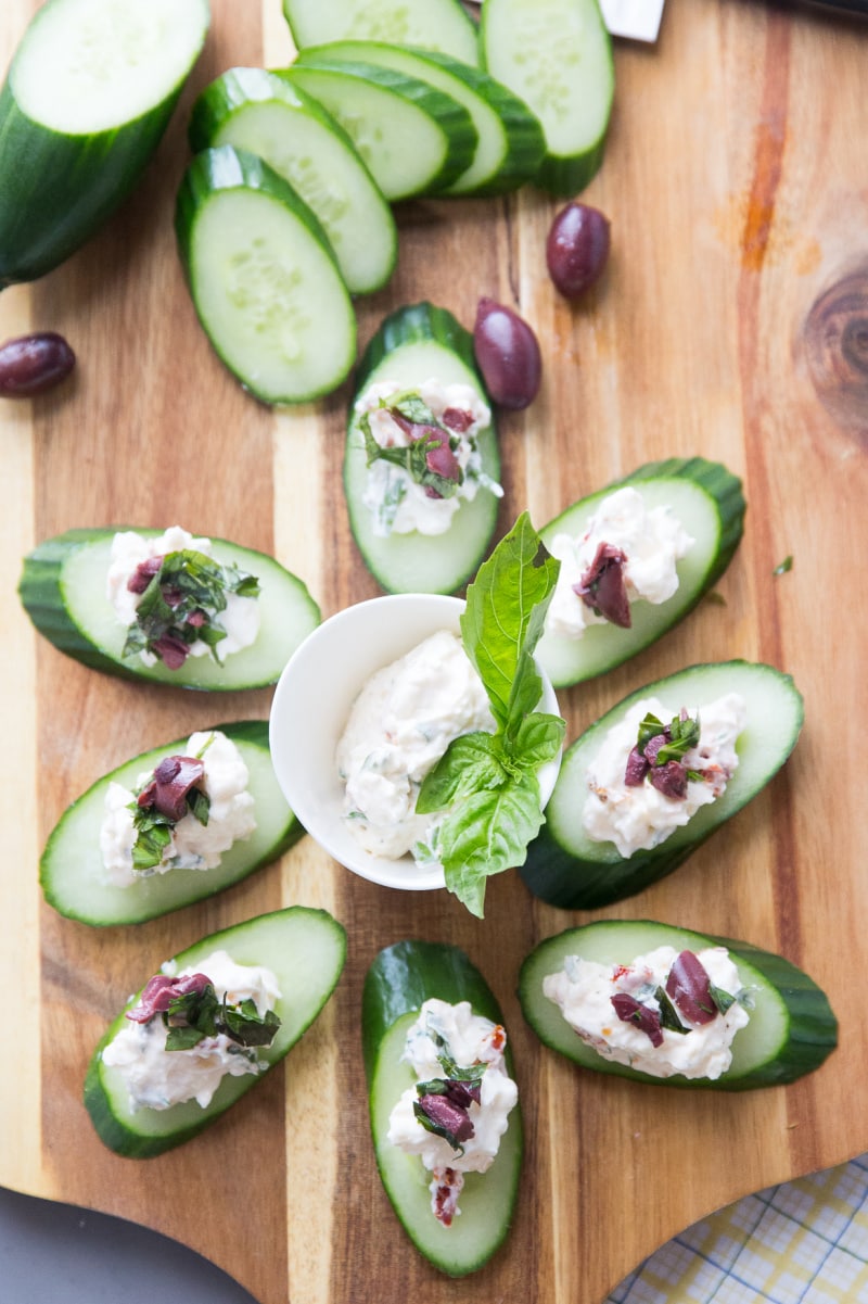 greek salad bites displayed on board