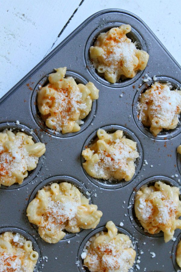 Mini Macaroni and Cheese Appetizers recipe from RecipeGirl.com : mac and cheese appetizer : #mini #macaroni #macandcheese #and #cheese #mac #macncheese #appetizer #appetizers #baked #recipe #RecipeGirl Mini Macaroni and Cheese Appetizers in a mini muffin tin ready for the oven