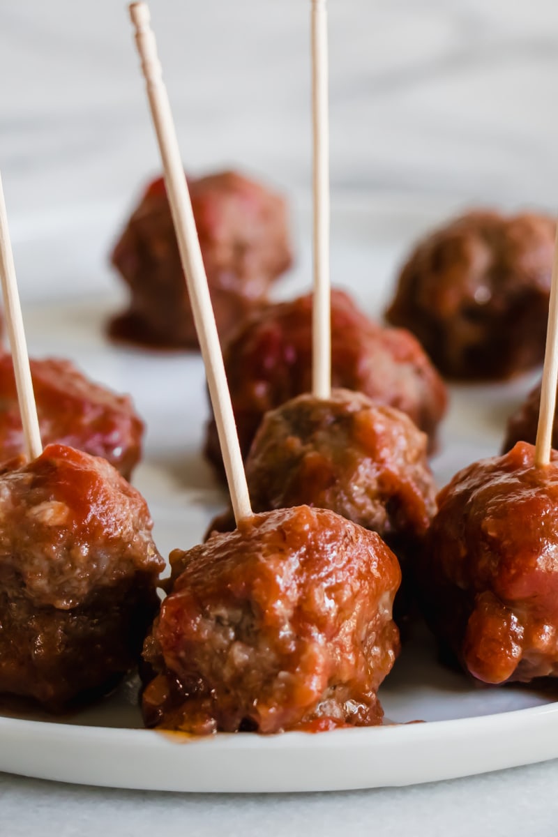 Sweet and Sour Meatballs appetizer recipe from RecipeGirl.com #sweet #sour #sweetandsour #meatballs #recipe #RecipeGirl sweet and sour meatballs with toothpicks
