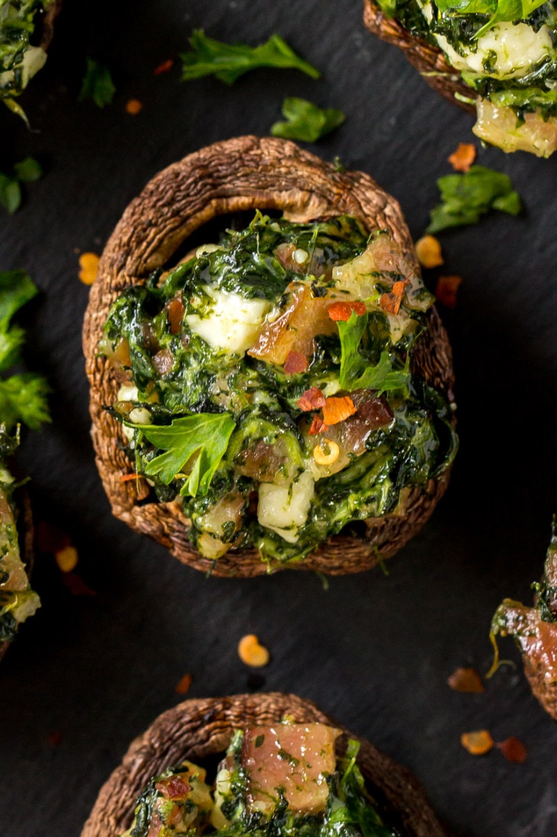 Roasted Mushrooms stuffed with feta, spinach and bacon recipe from RecipeGirl.com #roasted #stuffed #mushrooms #feta #spinach #bacon #recipe #RecipeGirl roasted and stuffed mushroom