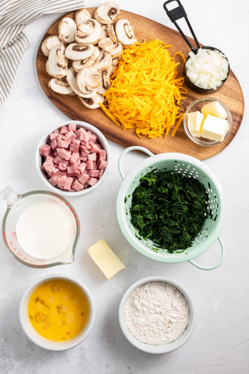 ingredients displayed for making ham and spinach puff pancake