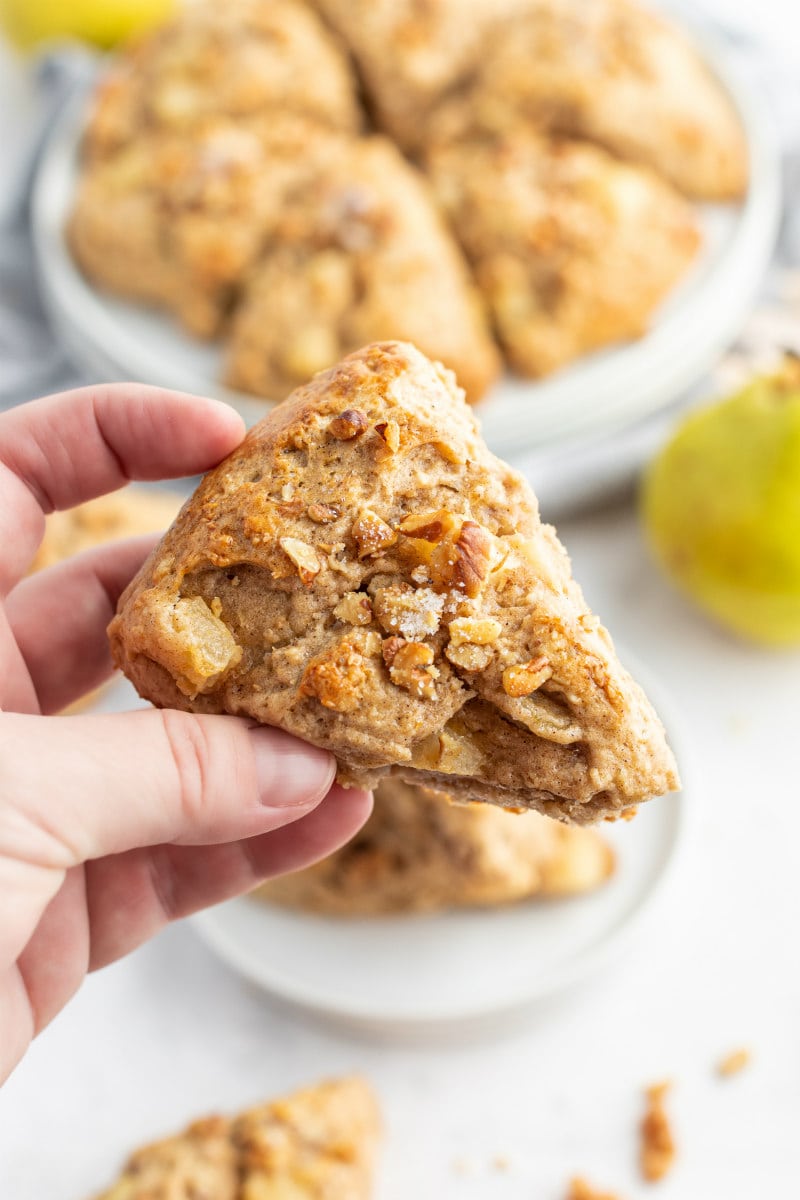 hand holding maple nut pear scone