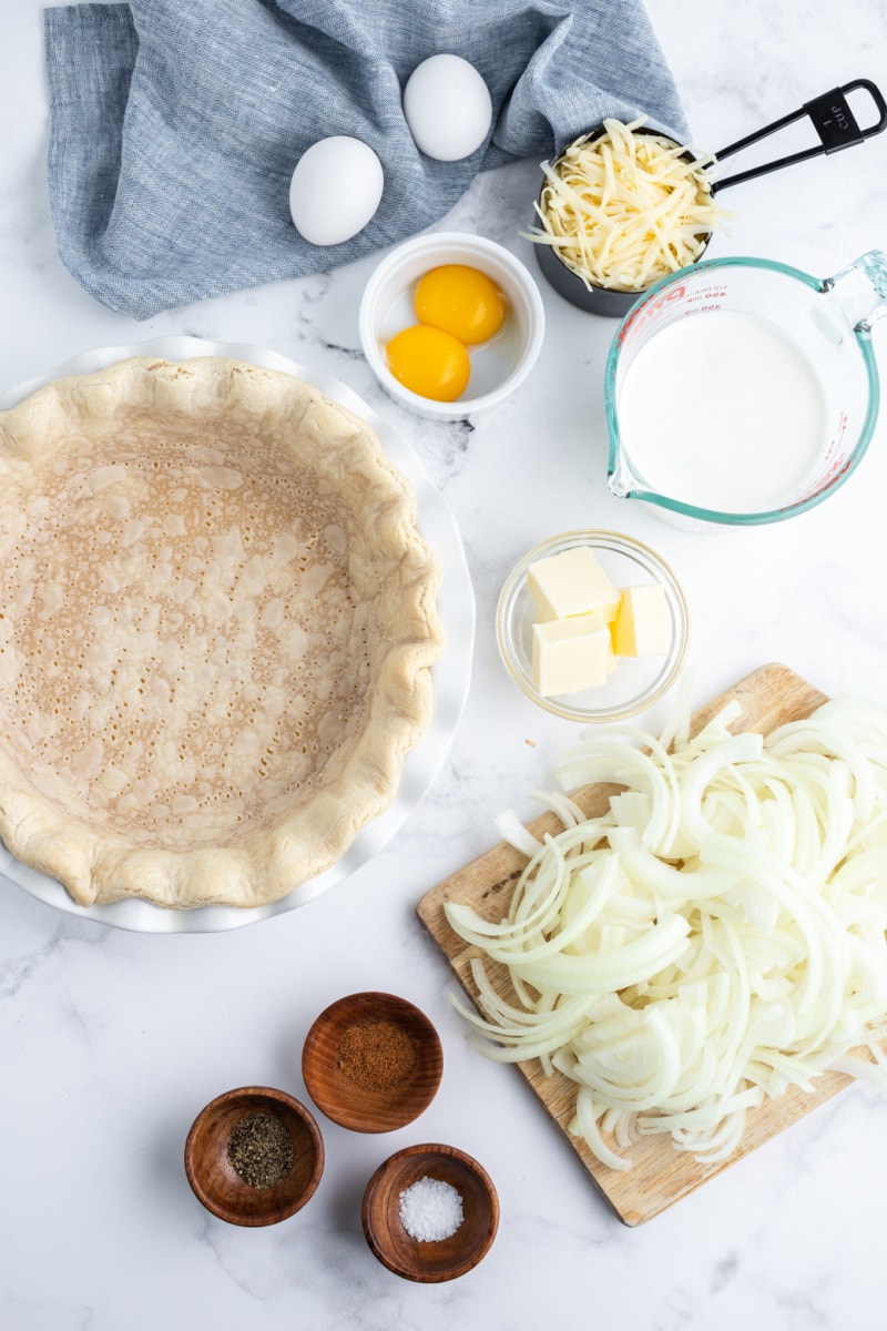 ingredients displayed for making swiss onion quiche
