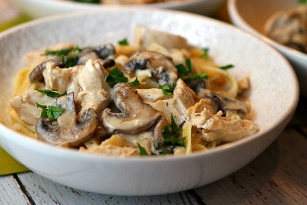 Chicken Mushroom Fettuccine recipe from RecipeGirl.com #chicken #mushroom #fettuccine #pasta #cream #sauce #recipe #RecipeGirl bowl of Chicken and Mushroom Fettuccine