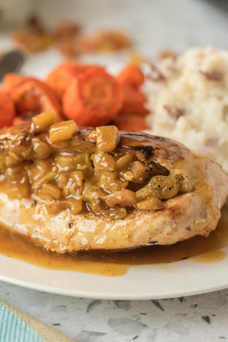 chicken with curried apple stuffing on plate