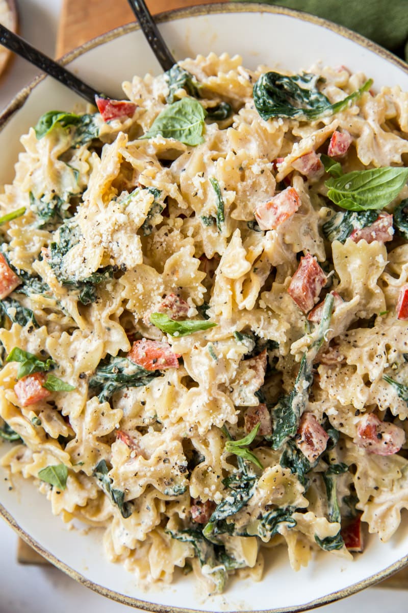 close up of farfalle pasta with spinach and ricotta cheese