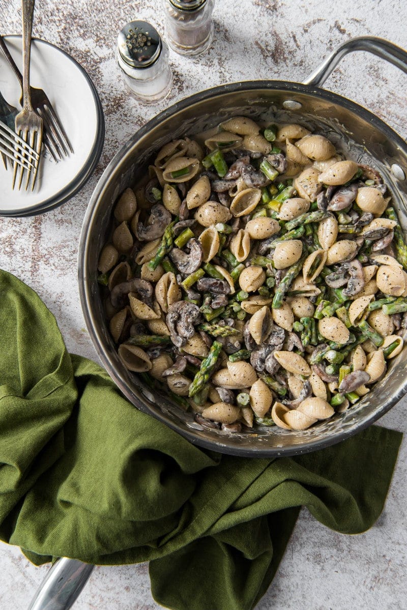 pasta shells with mushrooms and boursin in pan