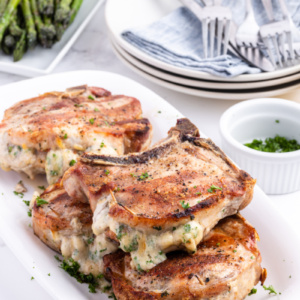 pork chops stuffed with smoked gouda on platter