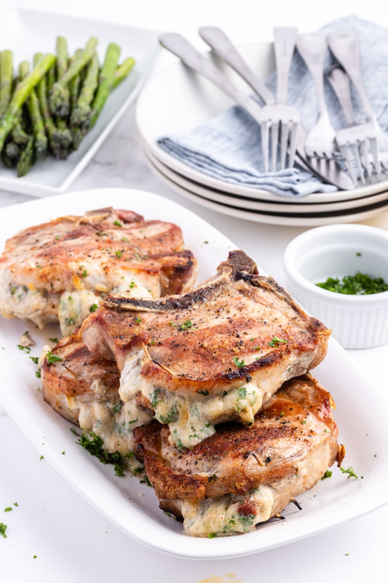 pork chops stuffed with smoked gouda on platter