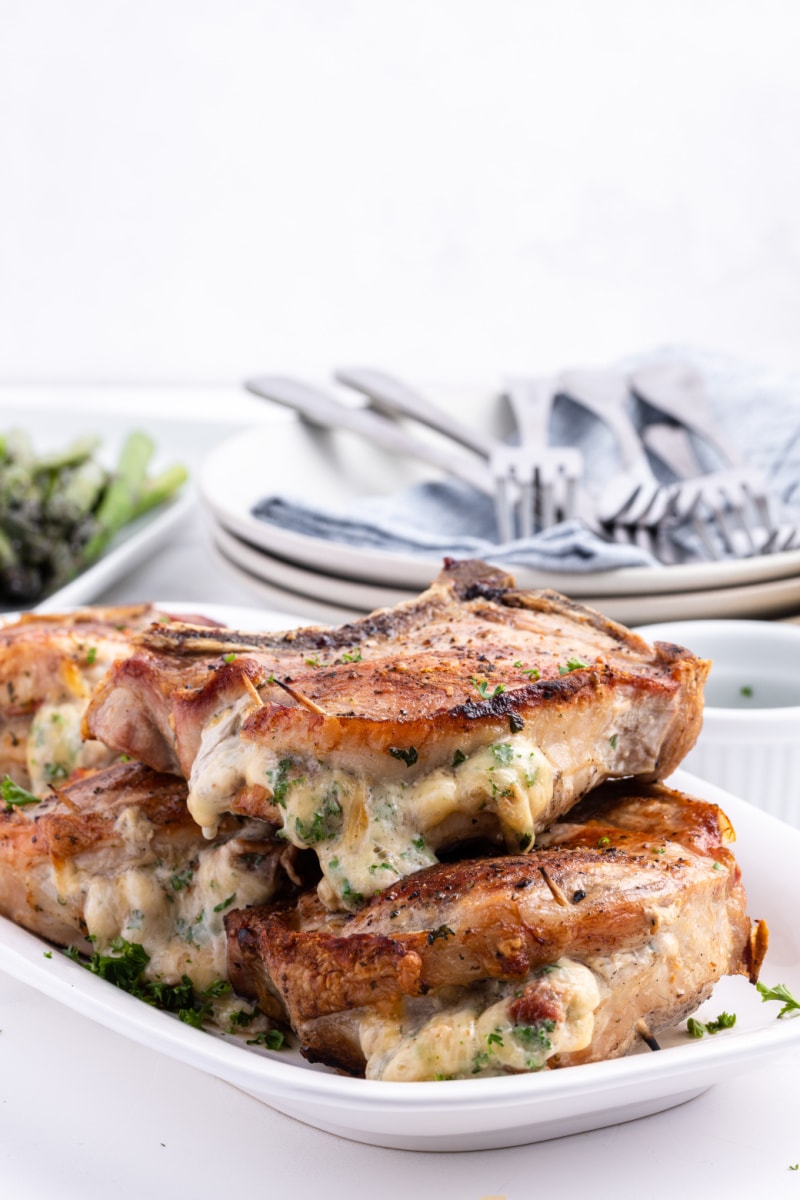 pork chops stuffed with smoked gouda on a plate