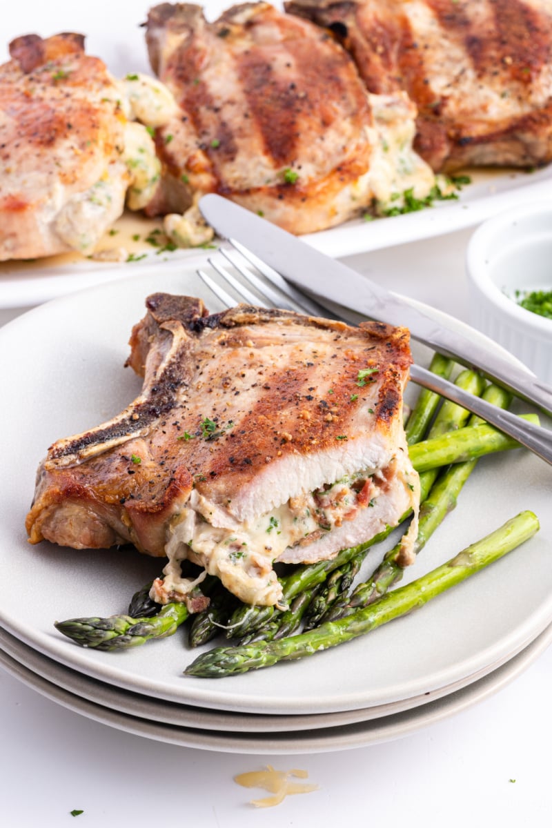 pork chops stuffed with smoked gouda cut open to see the inside