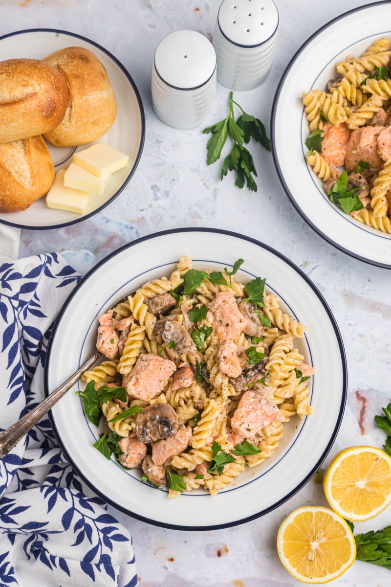 salmon fusilli in serving dishes