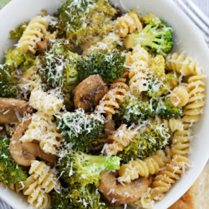 sun dried tomato pasta in a white bowl