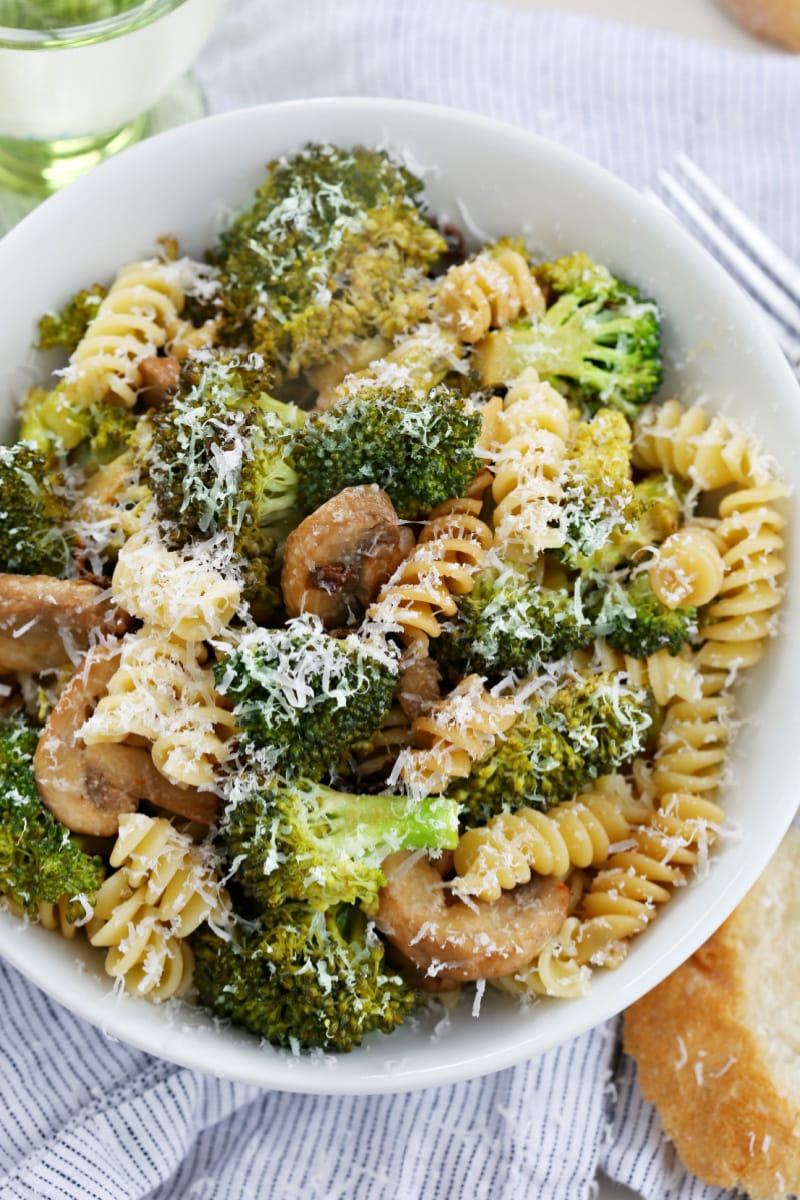 Sun Dried Tomato Pasta recipe from RecipeGirl.com #sundriedtomatoes #pasta #recipe #RecipeGirl sun dried tomato pasta in a white bowl