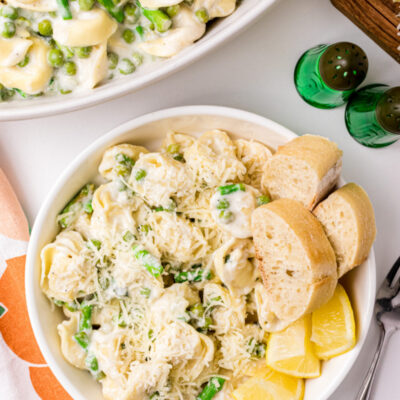 Tortellini, Peas and Asparagus with Creamy Tarragon Sauce in a bowl