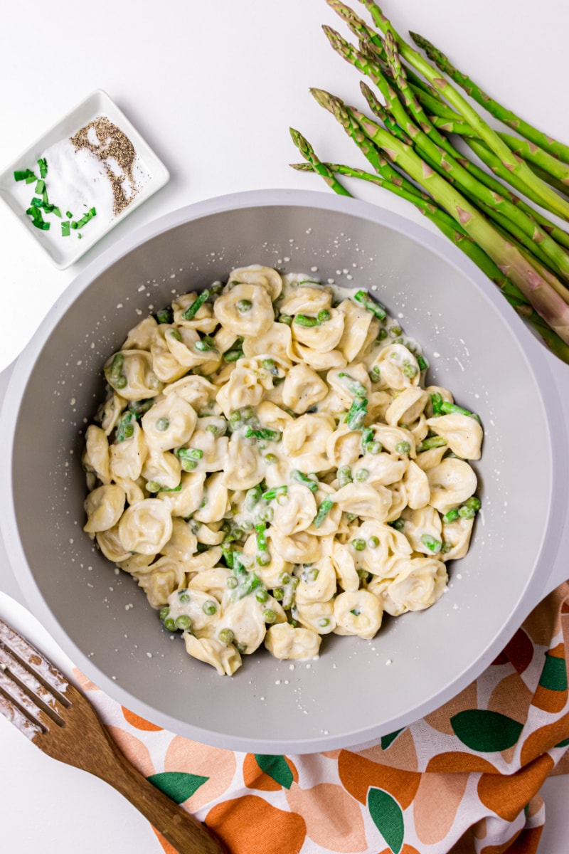 Tortellini, Peas and Asparagus with Creamy Tarragon Sauce in a pot