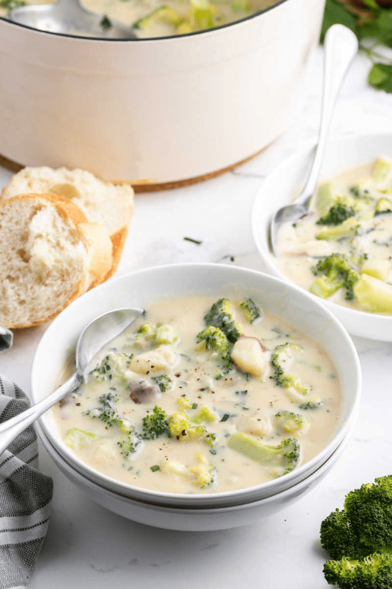 spoon in a bowl of broccoli potato soup