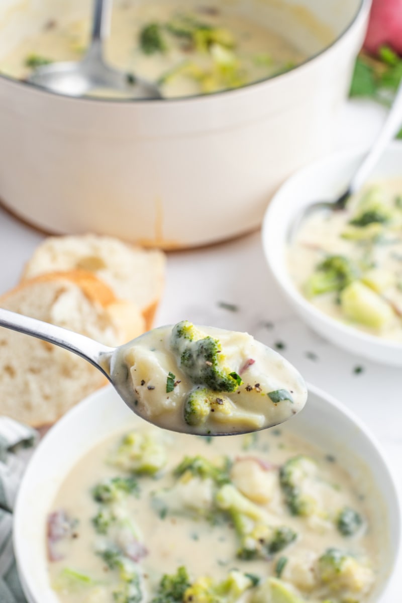 spoonful of broccoli potato soup over bowl