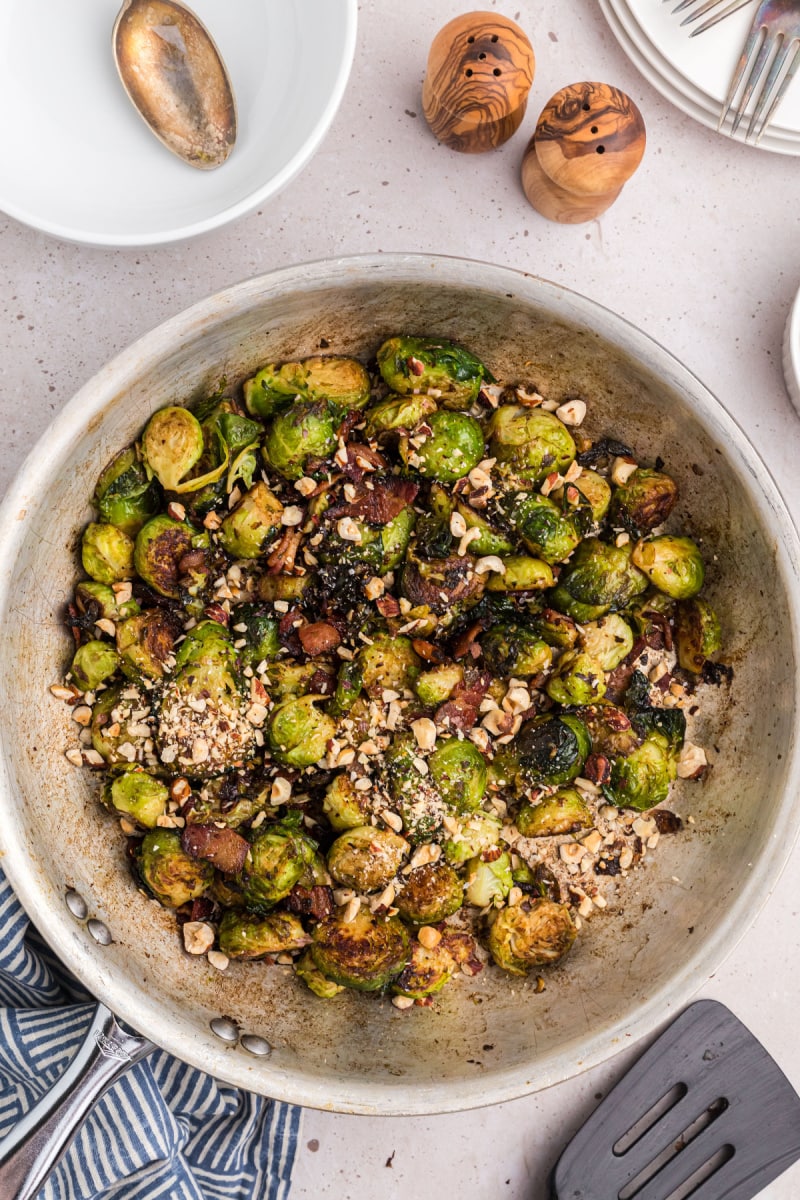 bowl of brussels sprouts with bacon and hazelnuts