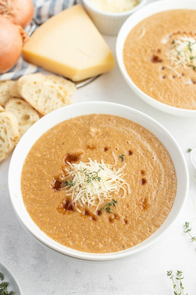 caramelized onion soup in a white bowl