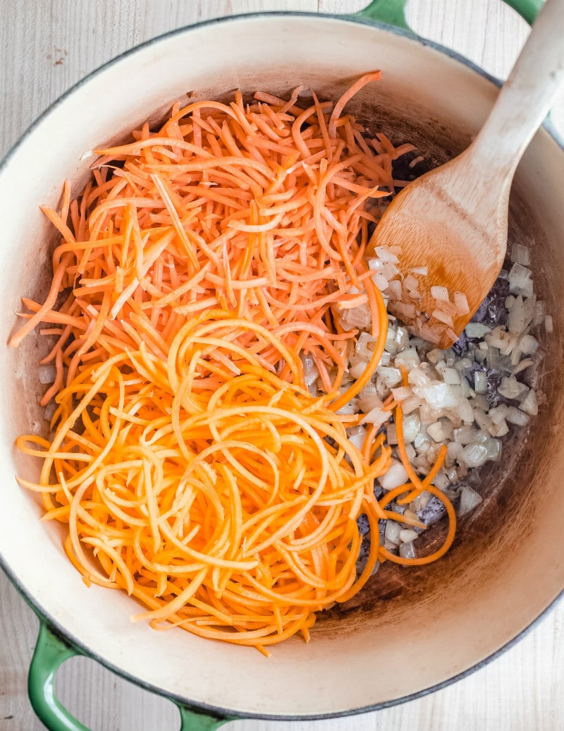 Carrot and Butternut Squash Soup recipe from RecipeGirl.com #carrot #butternut #squash #butternutsquash #soup #recipe #RecipeGirl sauteeing veggies for soup