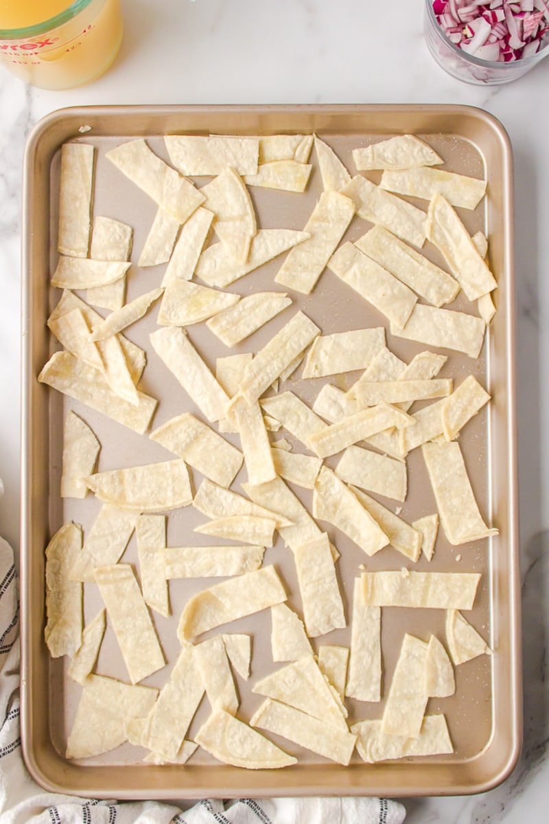 strips of tortilla on baking sheet