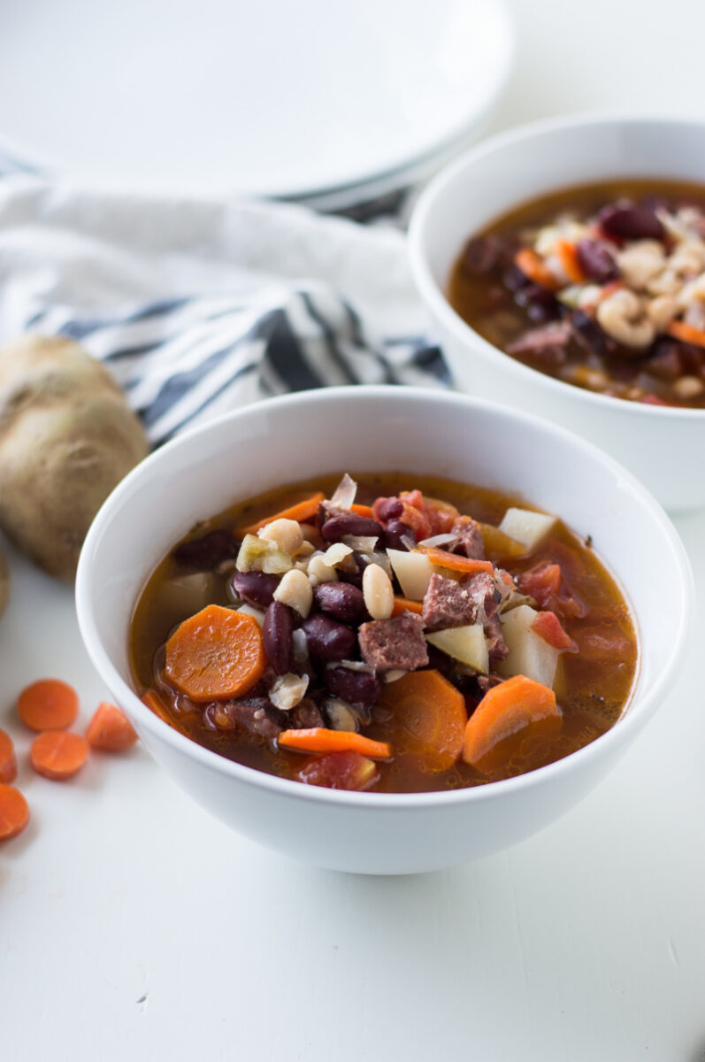 bean and chorizo soup in a bowl