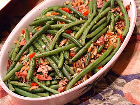 Garlic Green Beans with Prosciutto in a white casserole dish