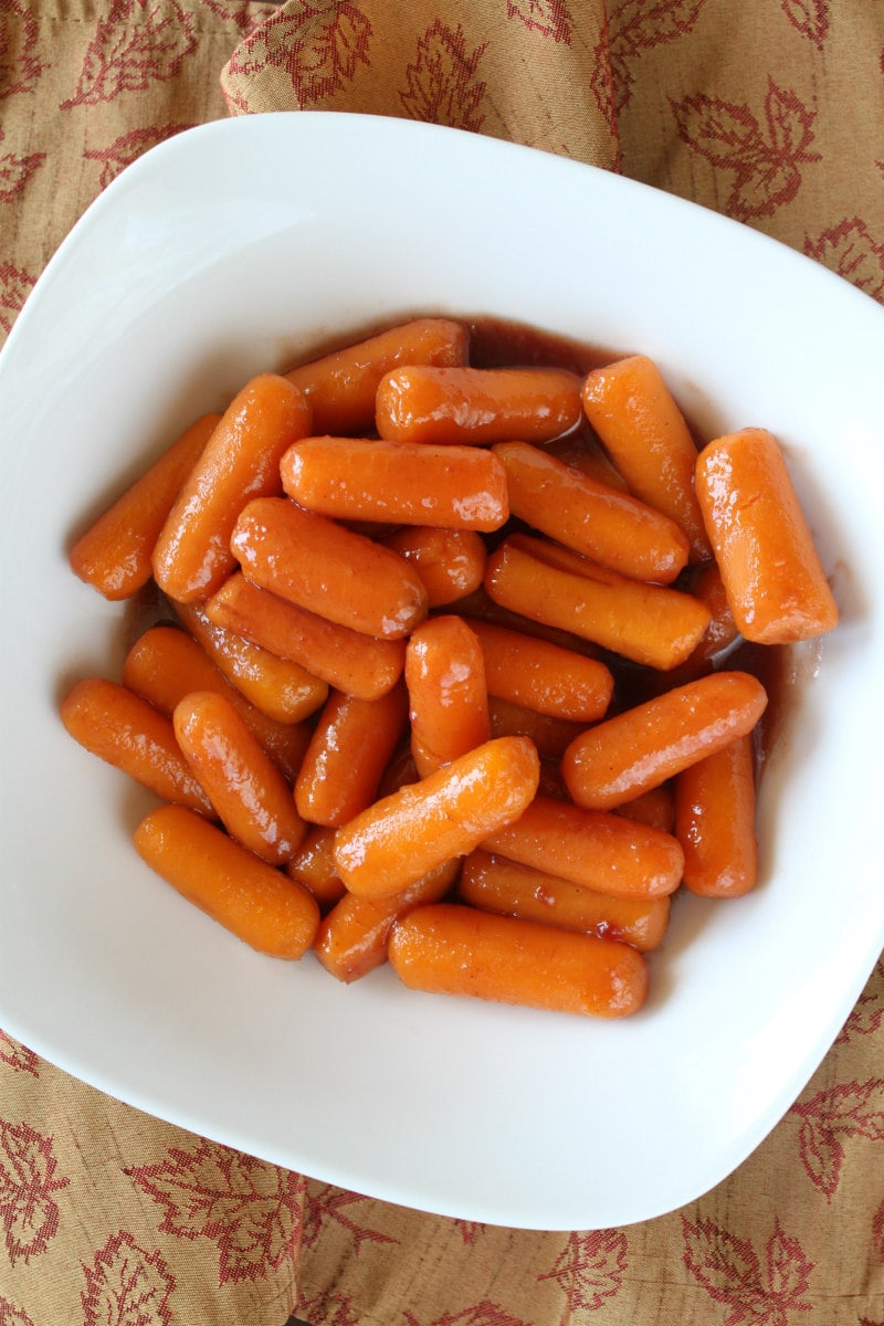 Glazed Cranberry Carrots recipe from RecipeGirl.com #glazed #cranberry #carrots #recipe #RecipeGirl Bowl of Glazed Cranberry Carrots