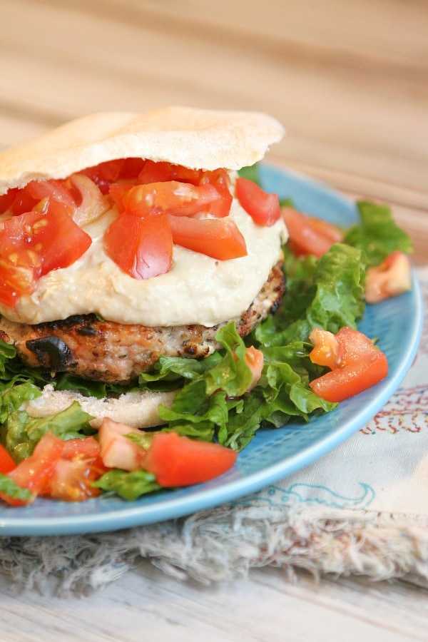 Greek Turkey Burgers recipe from RecipeGirl.com Greek Turkey Burger on blue plate