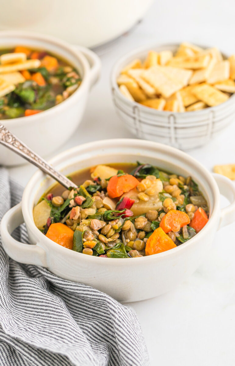 bowl of lentil soup with balsamic roasted vegetables