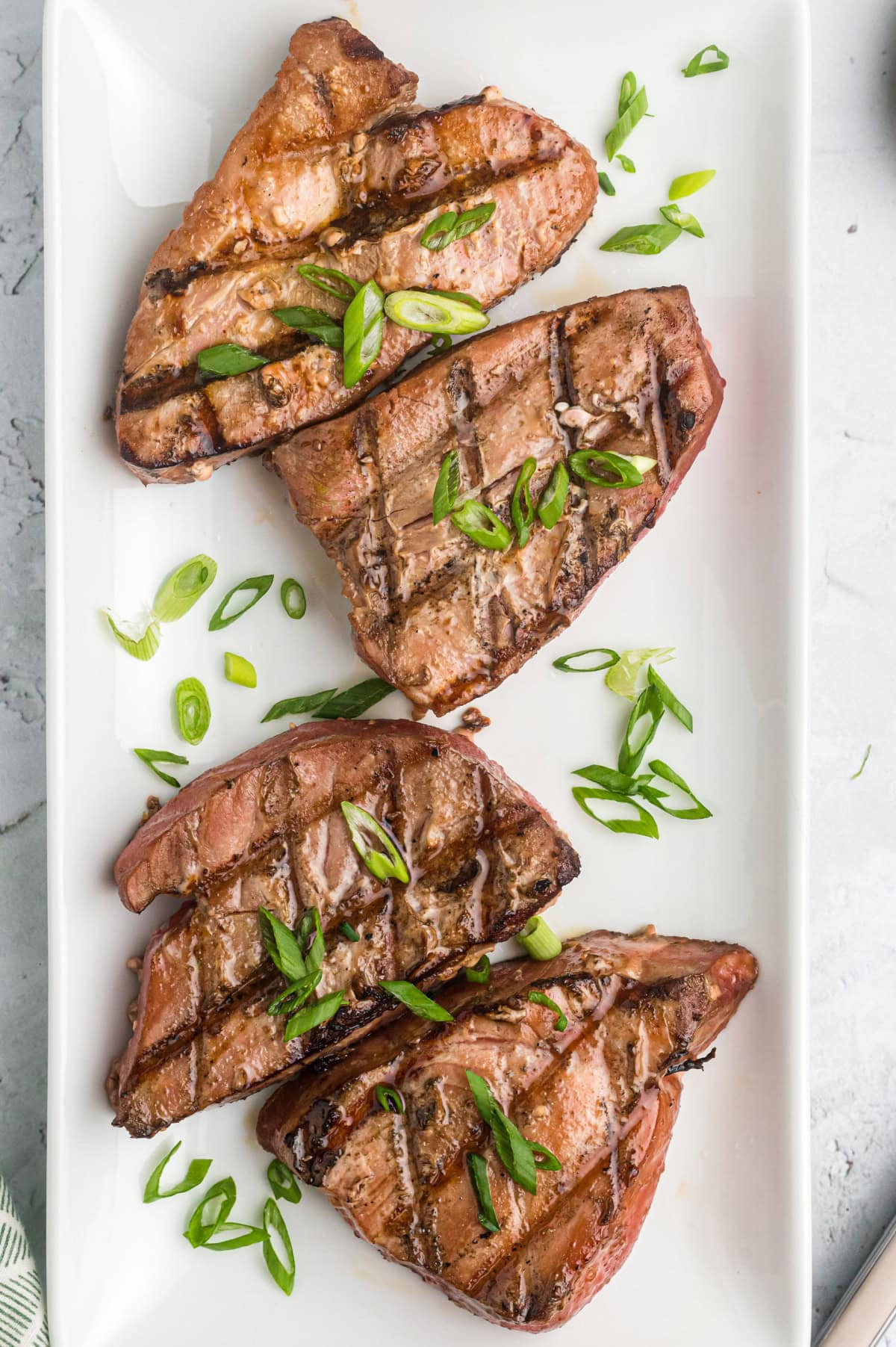 maple soy grilled tuna steaks on a serving platter
