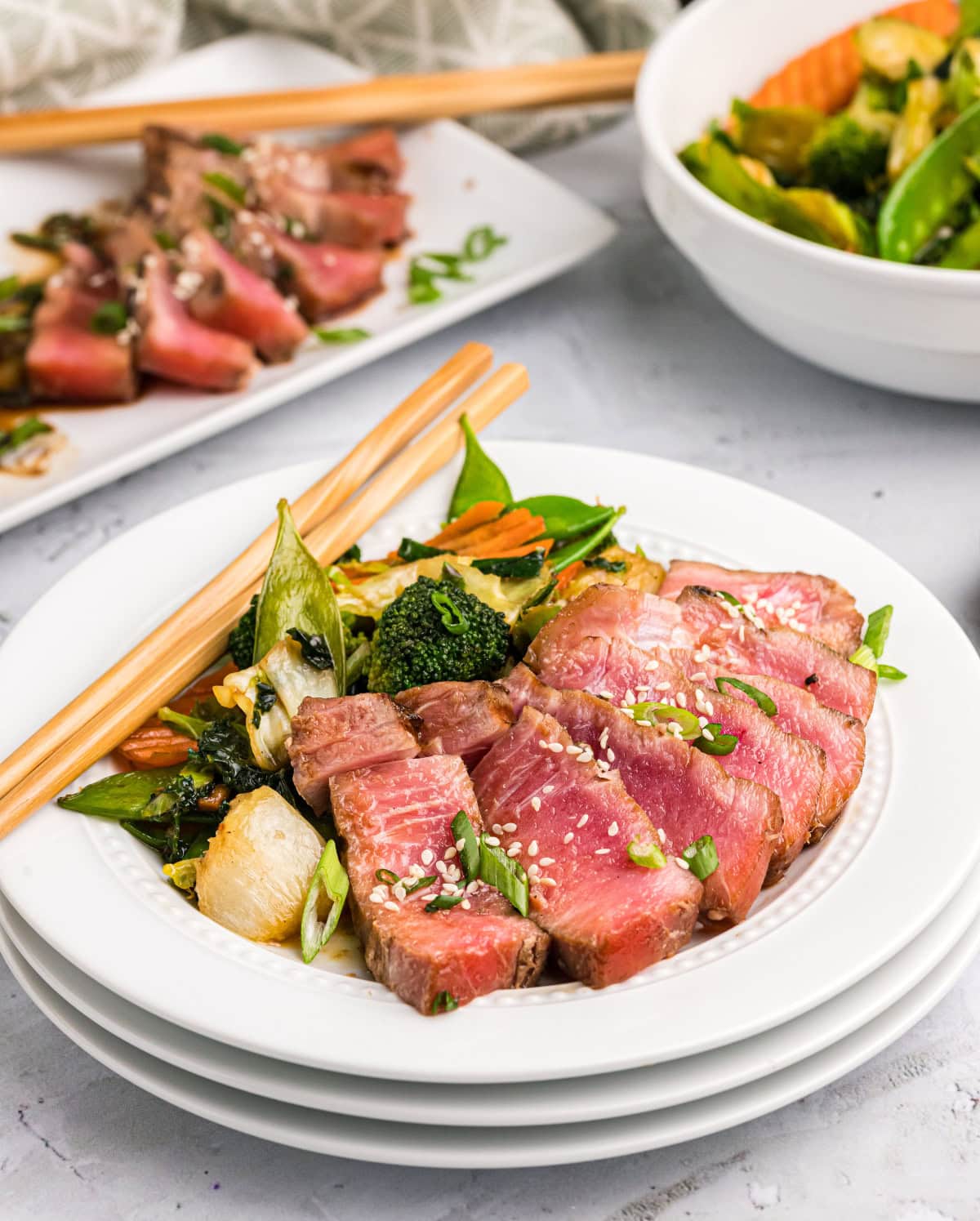 maple soy grilled tuna served on a plate with chopsticks