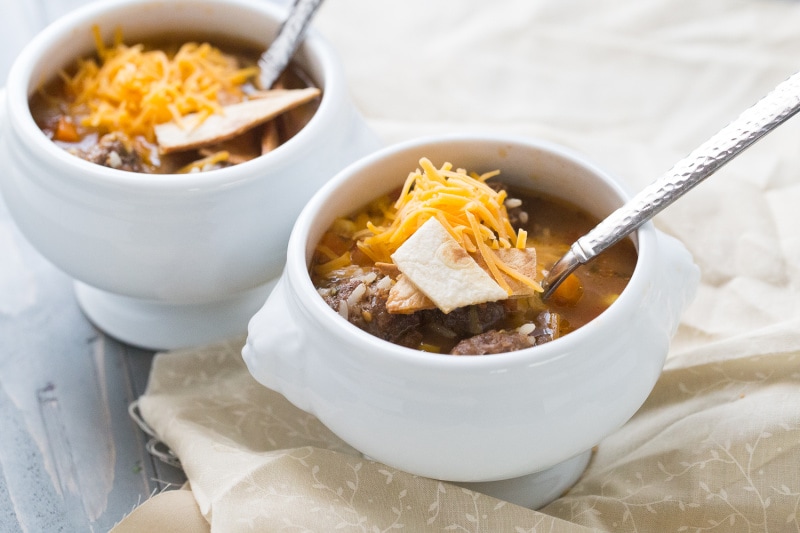 two white bowls of meatball soup