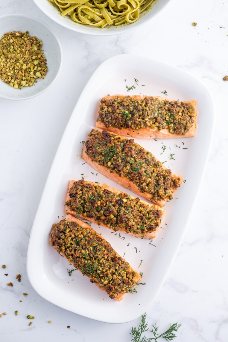 salmon fillets topped with pistachio
