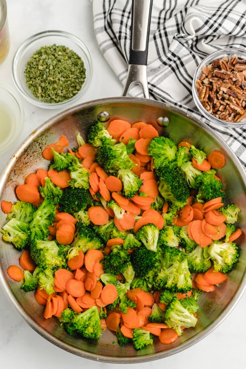 carrots and broccoli in a skillet