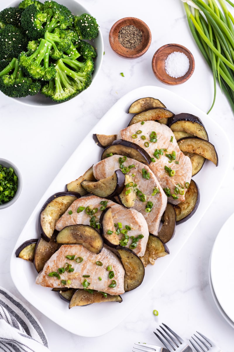 seared asian tuna steaks on a white platter