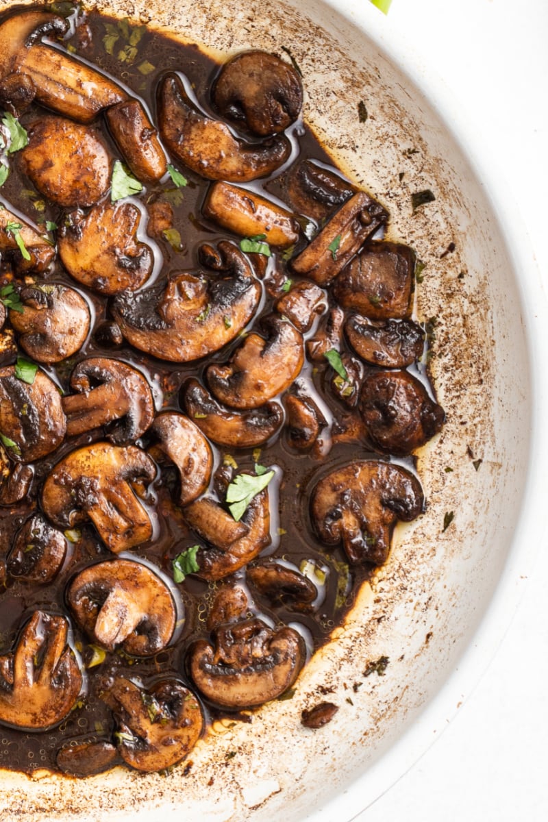 mushrooms and sauce in skillet
