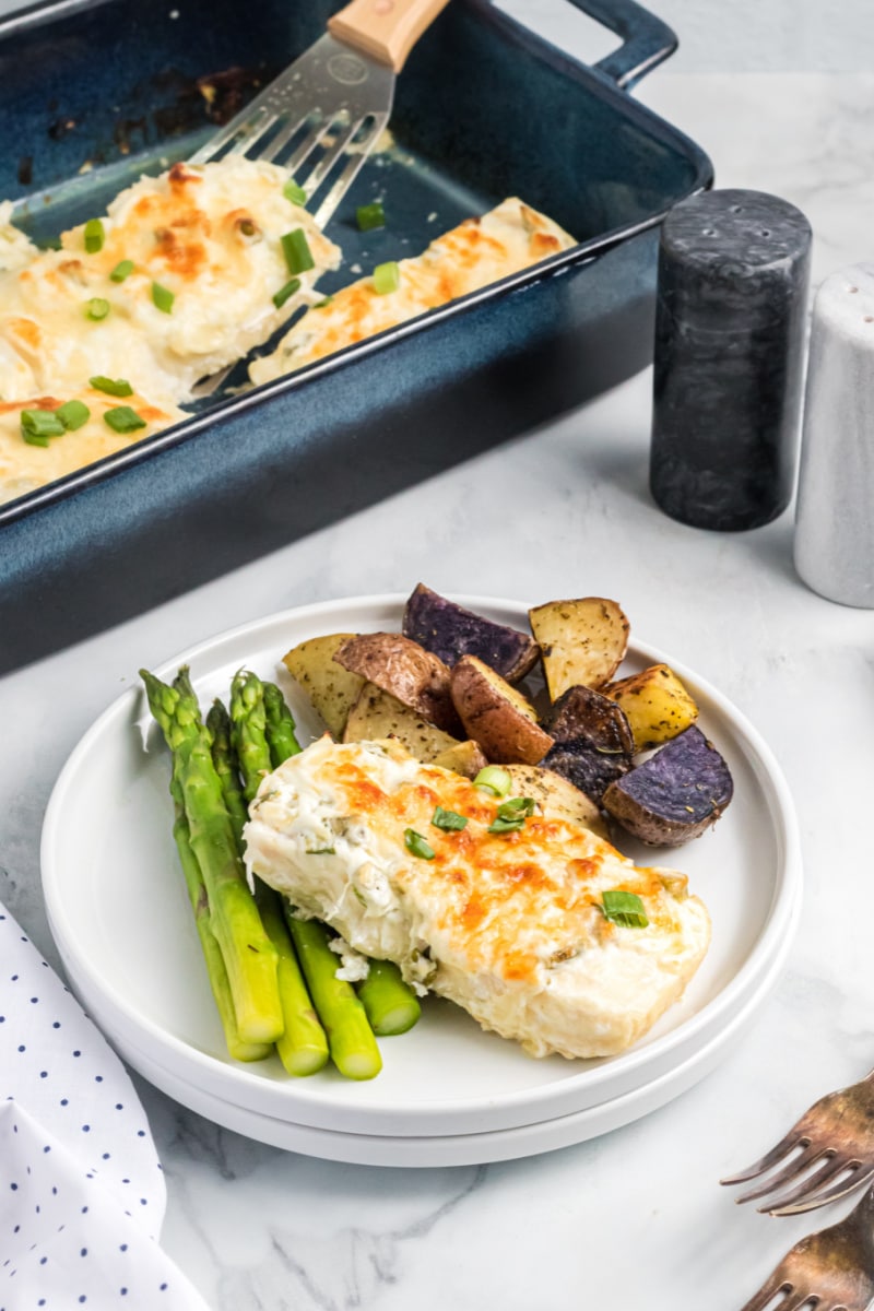 halibut plated with asparagus and potatoes