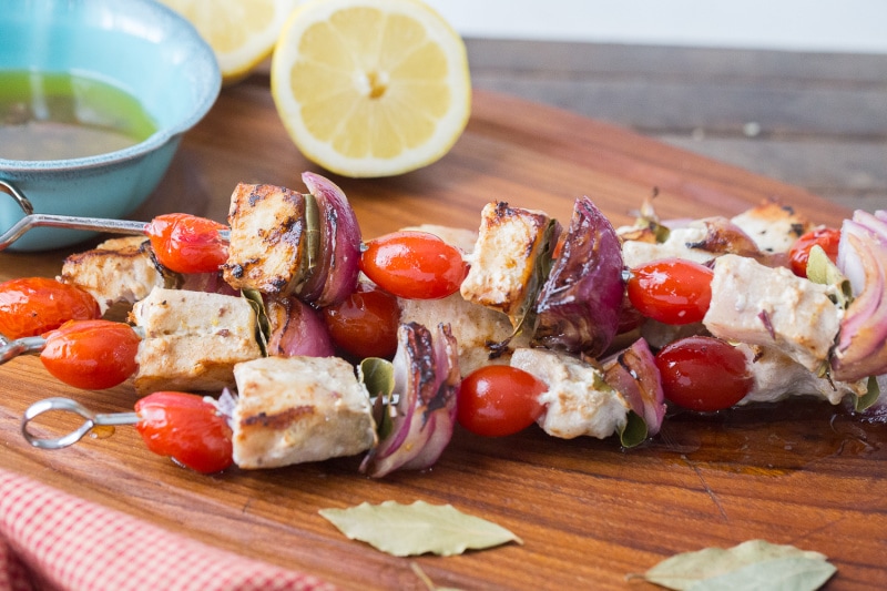 swordfish souvlaki an a board